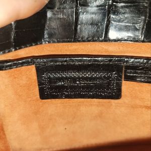 Nancy Gonzalez clutch